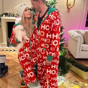 Selling two Tipsy Elves Adult Onsies one size Medium one is a size Large.